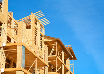 Brand new low-rise building under construction on sunny day in British Columbia, Canada