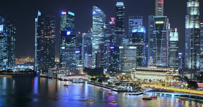 Skyscrapers and modern office buildings in Singapore at night. Luxury property