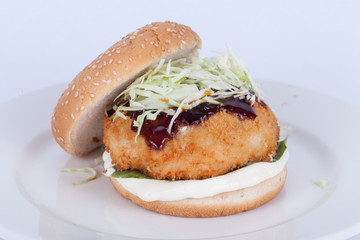  Fast food, delicious fish burger, beautifully laid out on a wooden background, for culinary design