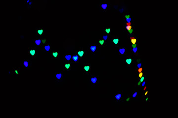 Colorful abstract heart shape blured bokeh at night