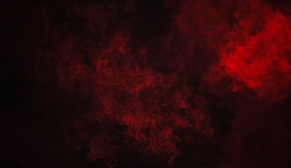 Fototapeta premium Red fog and mist effect on isolated black background for text or space. Texture smoke