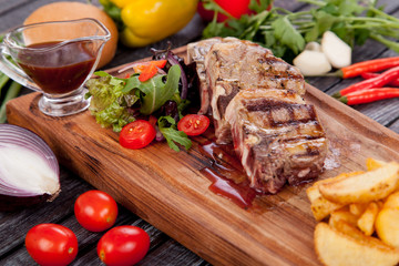  juicy and appetizing steak tamogavok of horse meat on the table, for design in cooking