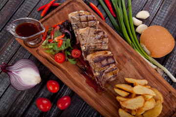  juicy and appetizing steak tamogavok of horse meat on the table, for design in cooking