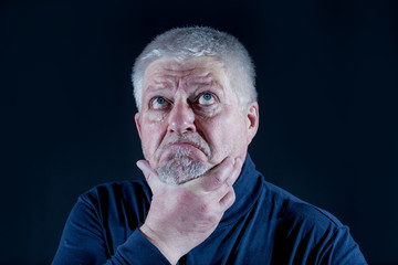 Obraz premium a portrait of a brooding, older man