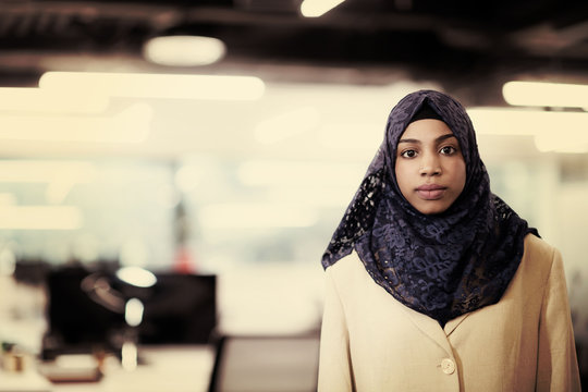 Portrait of black muslim female software developer