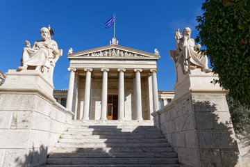 Fototapeta na wymiar national academy of Athens Greece, main facade view with Plato and Socrates statues
