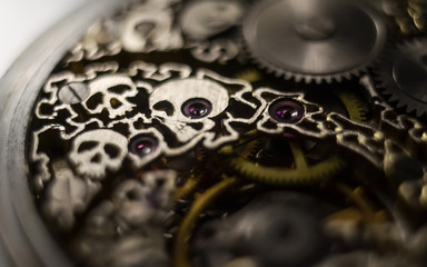 Skeleton of vintage handmade antique mechanical pocket watches, clockwork old mechanical watch, high resolution and detail, winter time and summer time concept. selective focus.