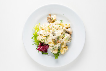 Traditional salad with cooked vegetables with mayonnaise.
