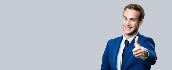 businessman with thumbs up gesture