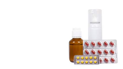 Bottle with medicine, nasal spray. Antipyretic syrup and pills. Medication for cold treatment