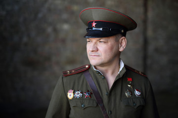 Officer of the Soviet army.  Historical reconstruction, a man in the form of a Soviet officer...