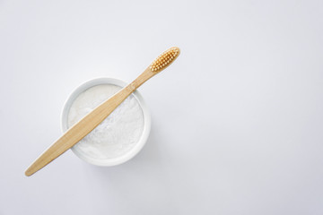 Wooden toothbrush with powder