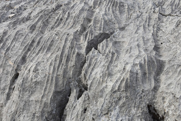 Rock formation in Sicevo gorge. Stone background, strange waves in the rock