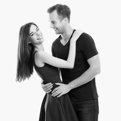 portrait of young happy hugging couple