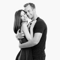 portrait of young happy hugging couple