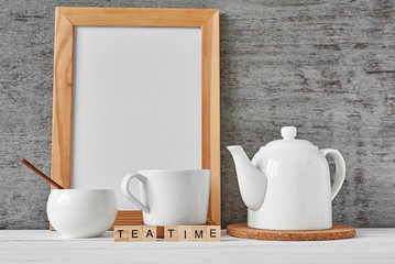 Cup of tea, teapot, sugar bowl, mockup
