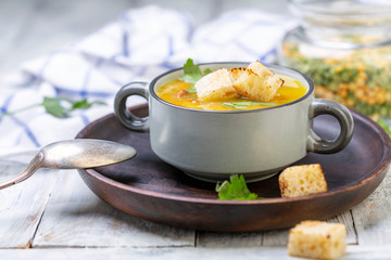Thick soup of split peas with croutons.