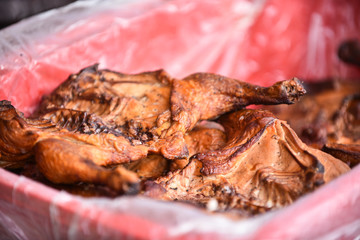 Smoked chicken slowly stewed packed in a plastic box
