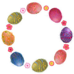 Easter Eggs and Spring Flowers Round Wreath Isolated on White.  Round Frame with Multicolored Decorated Eggs and Flowers.