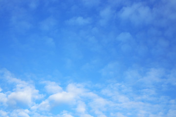 fluffy white cloud on clear blue sky