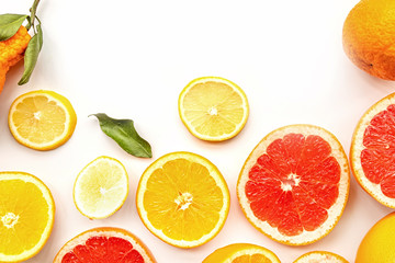 fresh summer citrus fruits on white background flat lay top view