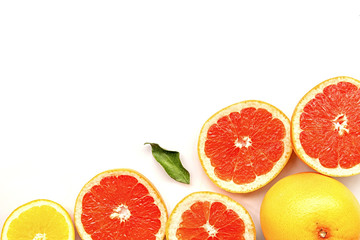fresh summer citrus fruits on white background flat lay top view