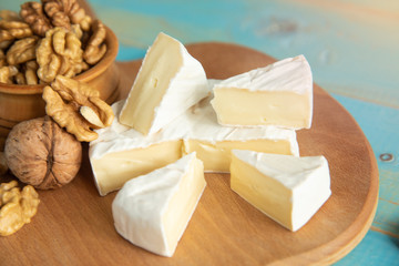 Cheese camembert or brie with walnut kernels