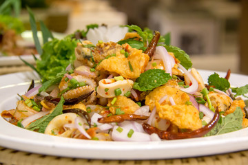  seafood spicy salad in white dish