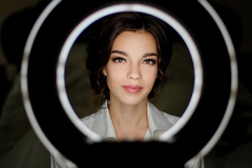 portrait of a beautiful brunette girl with brown eyes