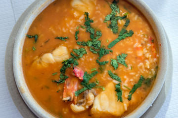 Plate of traditional soup called Caldeirada in Portugal