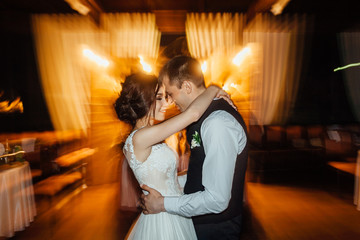 Luxury dance of the bride and groom in motion. Long exposure