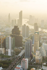 Obraz premium high view of the city in sunset time / High view of Bangkok city in sunset
