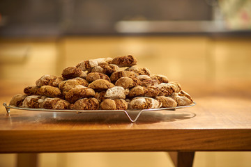 Stack of cookies in a modern kitchen just cooling out of the ove
