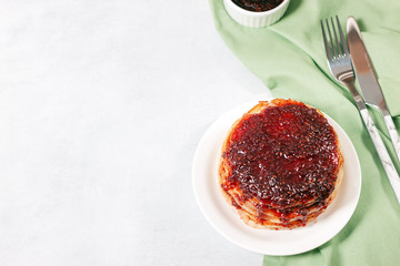 Classic american pancakes with raspberries jam