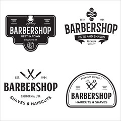 Fototapeta premium Set of vintage barbershop labels. Templates for the design of logos and emblems. Collection of barbershop - symbols razor, pole, scissors.
