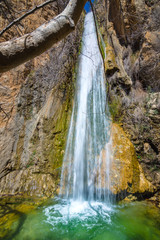 Fototapeta na wymiar Waterfall in the gorge of Milonas near famous beach of Agia Fotia, Ierapetra, Crete, Greece.