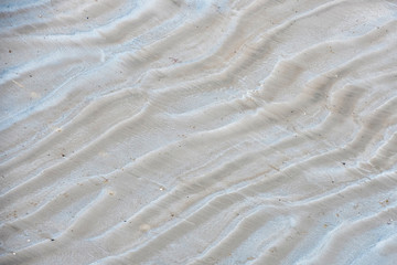Fototapeta na wymiar waves in the beach sand