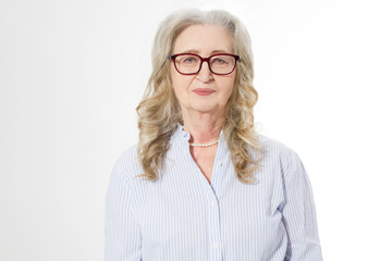 Senior business woman with stylish glasses and wrinkle face isolated on white background. Mature healthy lady. Copy space. Seniors lifestyle and old people happy success career concept.