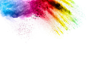 Launched colorful powder on black background.Color powder explosion.Colorful dust splashing.