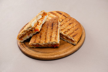 sandwich on wooden board