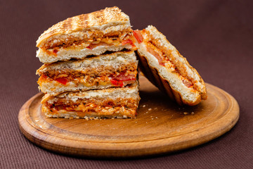 sandwich on wooden board