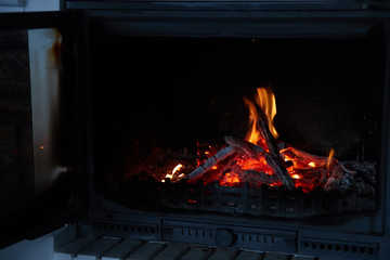 fire in the fireplace. concept of home comfort and warm atmosphere. cozy home