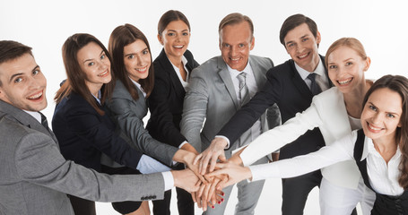 Business people hold pile hands
