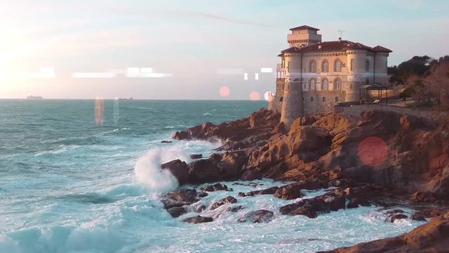Castello rurale antico in balia delle onde su un isola in mezzo alla tempesta.