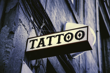 Tattoo hall sign - Powered by Adobe