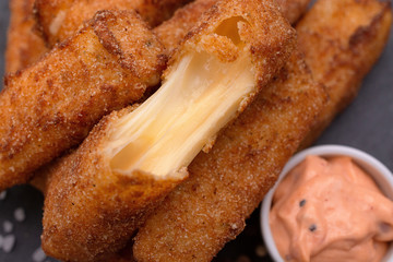 Cheese sticks with sauce