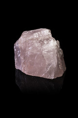 Rose Quartz Crystal on a Reflective Black Background