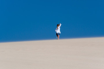 people walking in the desert