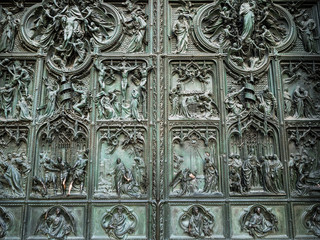 decorated outdoor doors of Milan Cathedral