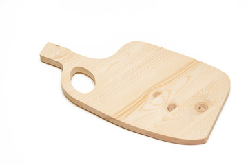 pine cutting board made as result of milling cutting on a white background